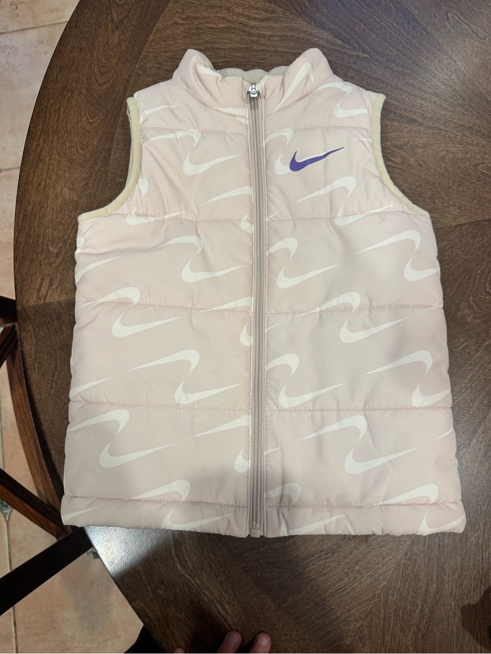 Nike Kids Light Pink Puffer Vest with White Swoosh Pattern